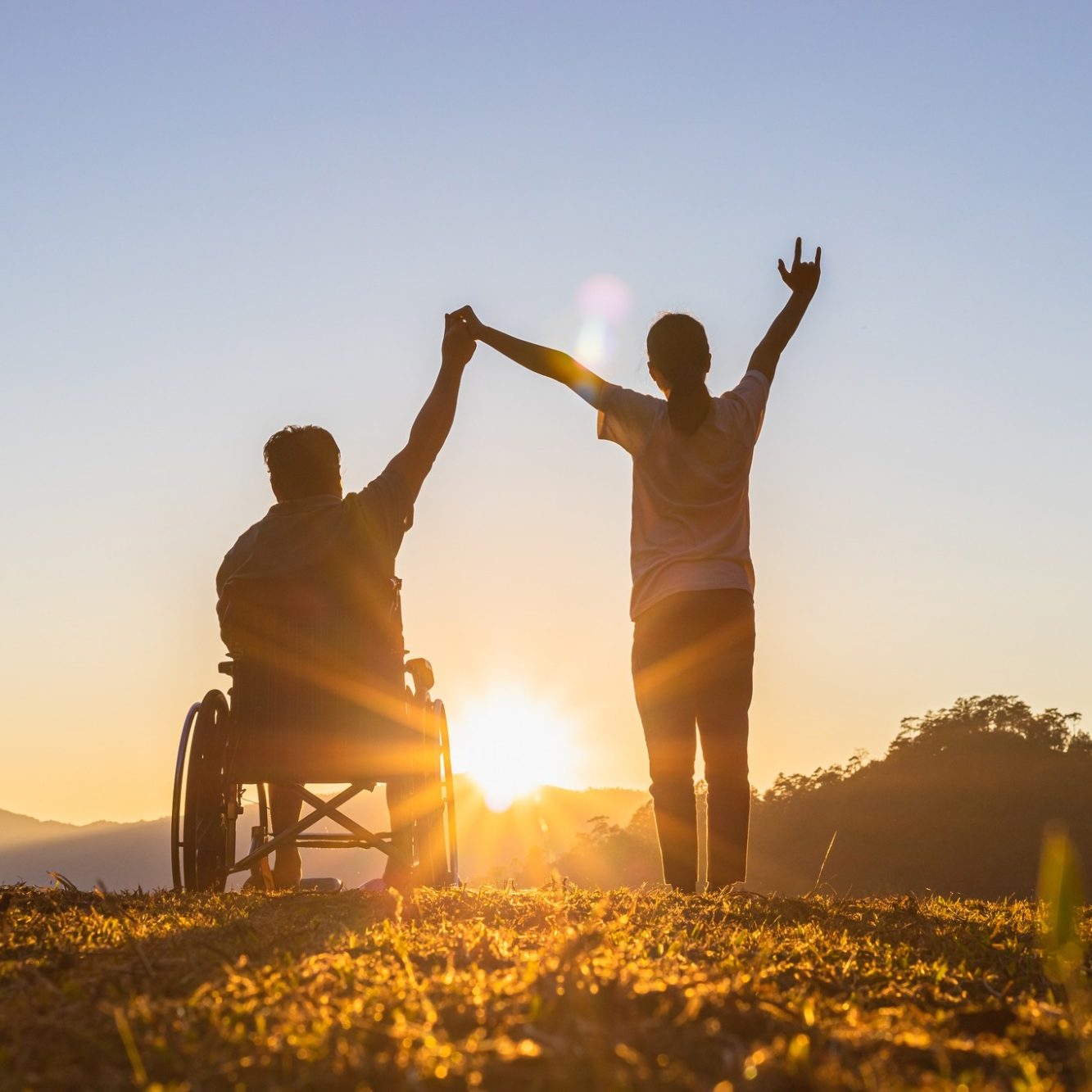 Accessible Family Holidays in Florida Wheelchair user enjoying time outdoors with family