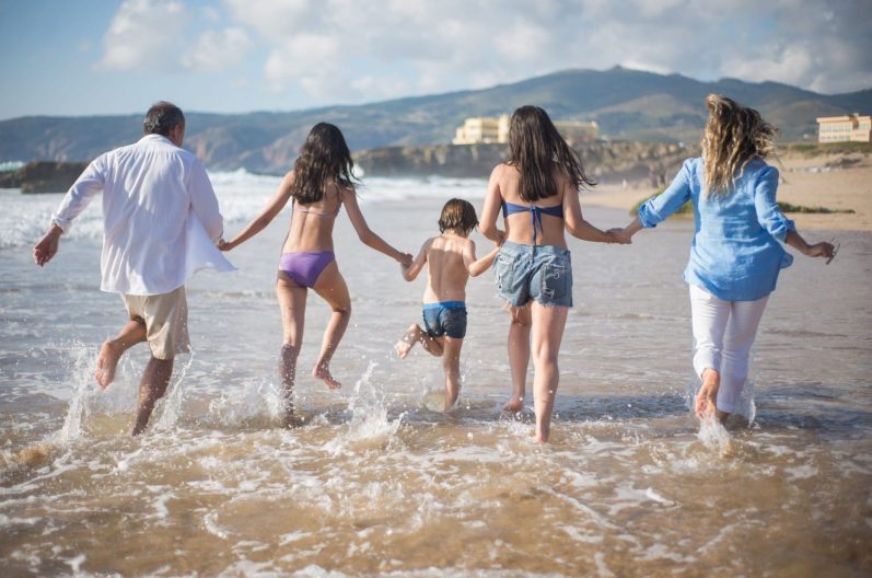 Family Beach Holiday Family enjoying time together on a beach holiday
