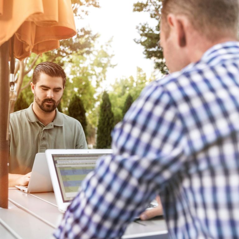 Support Before You Book Travel advisor discussing holiday options with a customer